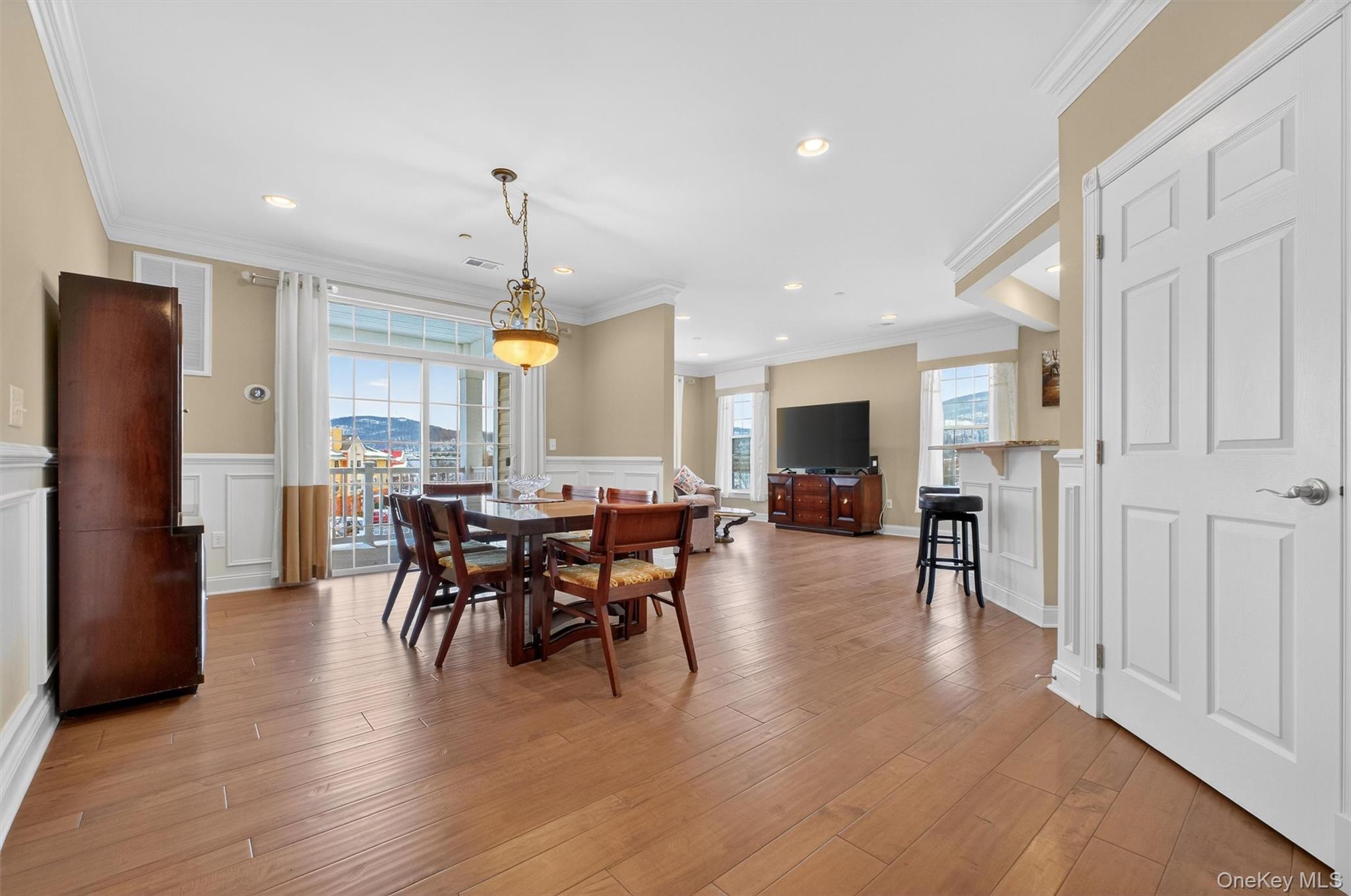 734 Regency Drive Fishkill, NY 12524 - Photo 7 of 45 a view of a a dining room with furniture window and wooden floor