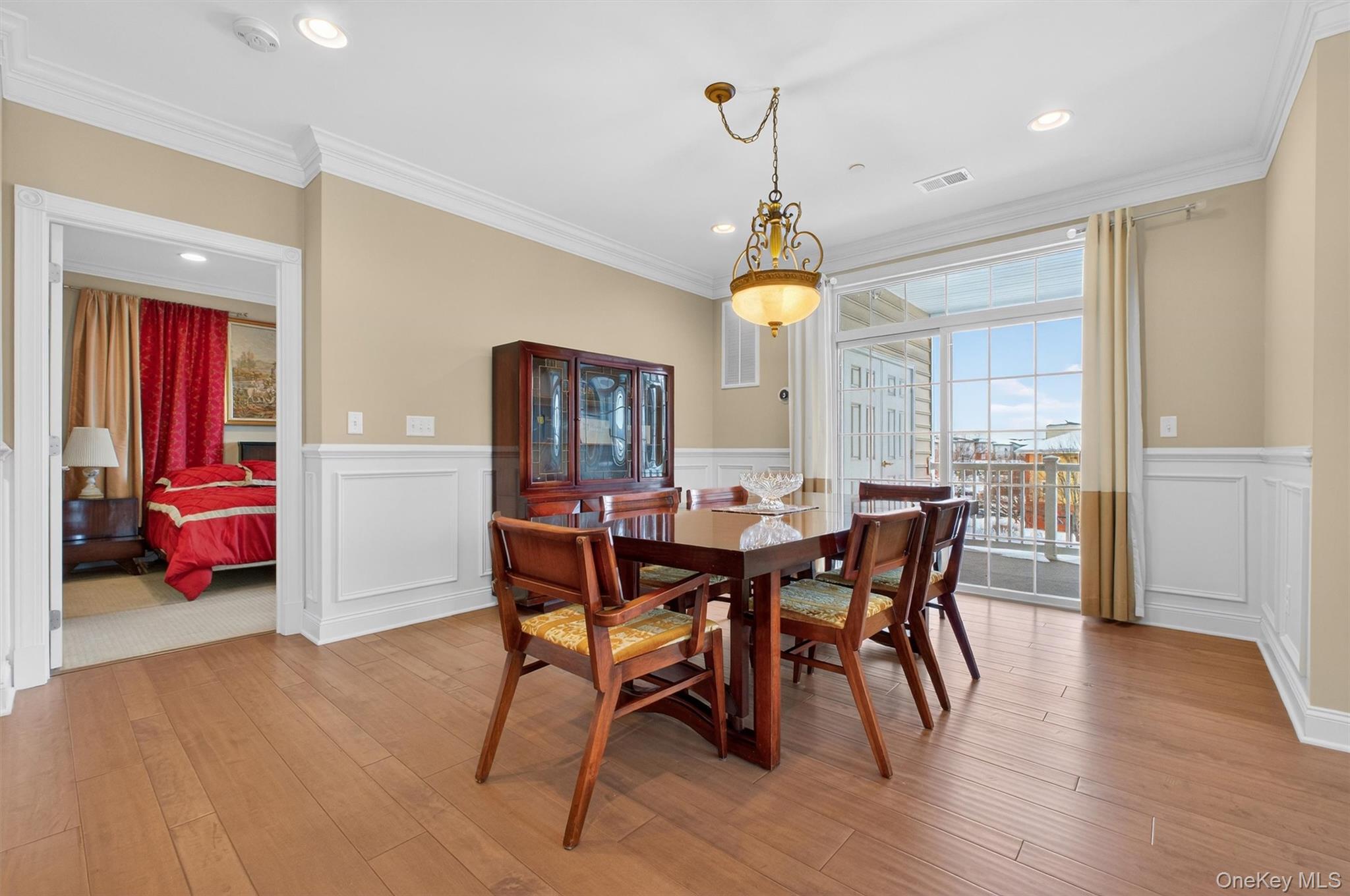 734 Regency Drive Fishkill, NY 12524 - Photo 8 of 45 a view of a dining room with furniture window and wooden floor