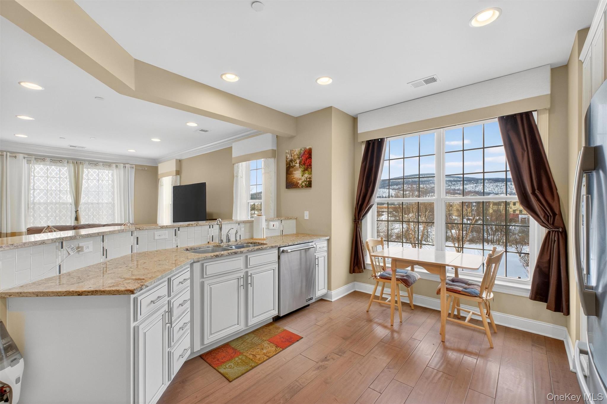 734 Regency Drive Fishkill, NY 12524 - Photo 10 of 45 a very nice looking dining room with a large window