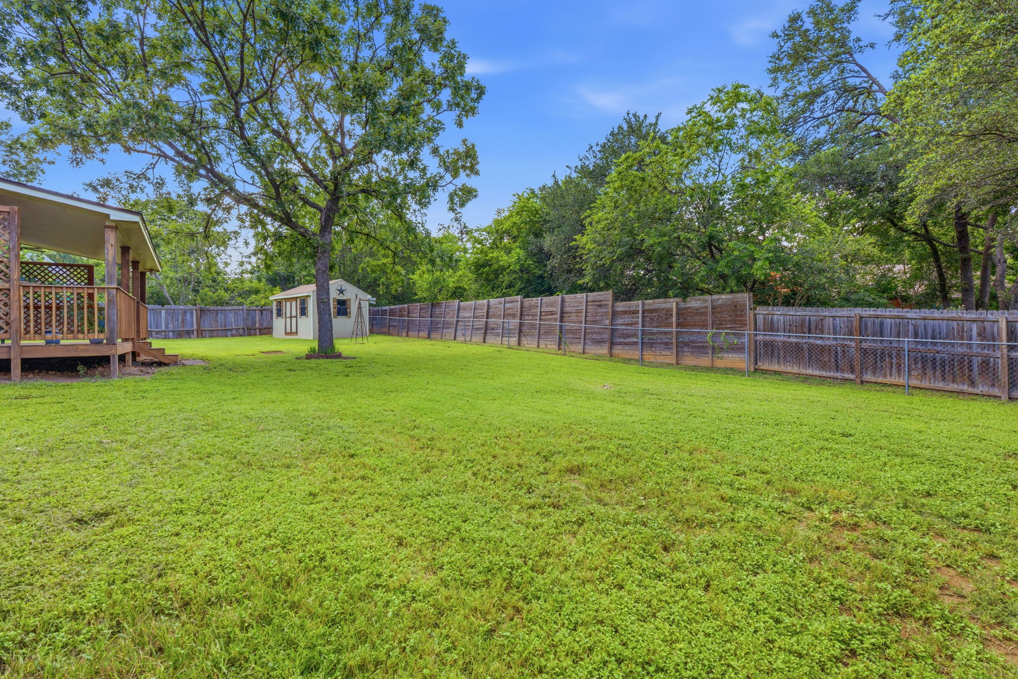 2702 Calabash Cove Austin, TX 78745 - Photo 13 of 40 a view of a yard with a large tree