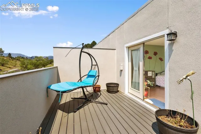 a view of a living room and a wooden floor