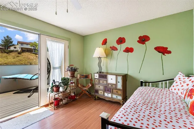 a bedroom with furniture and a bed