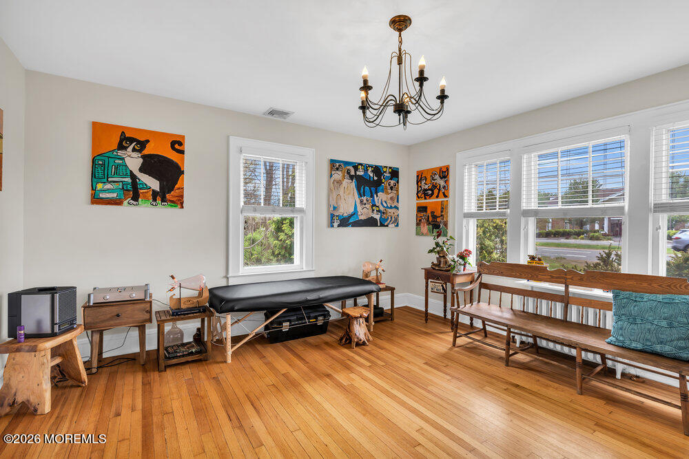 34 State Route Colts Neck, NJ 07722 - Photo 14 of 40 a view of a livingroom with furniture window and wooden floor