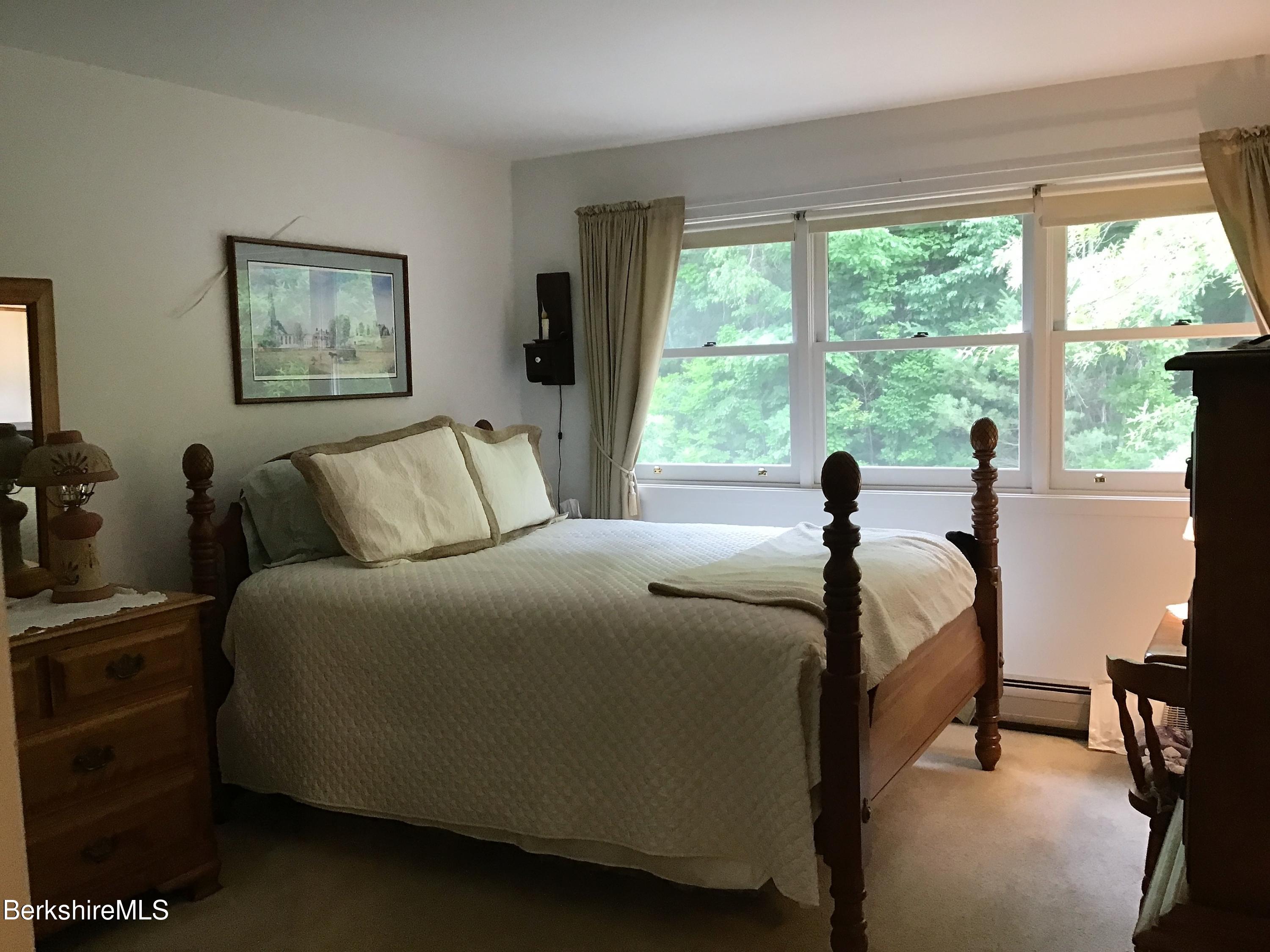 751 Mohawk Trail, Unit 1D North Adams, MA 01247 - Photo 19 of 32 a bedroom with bed and window