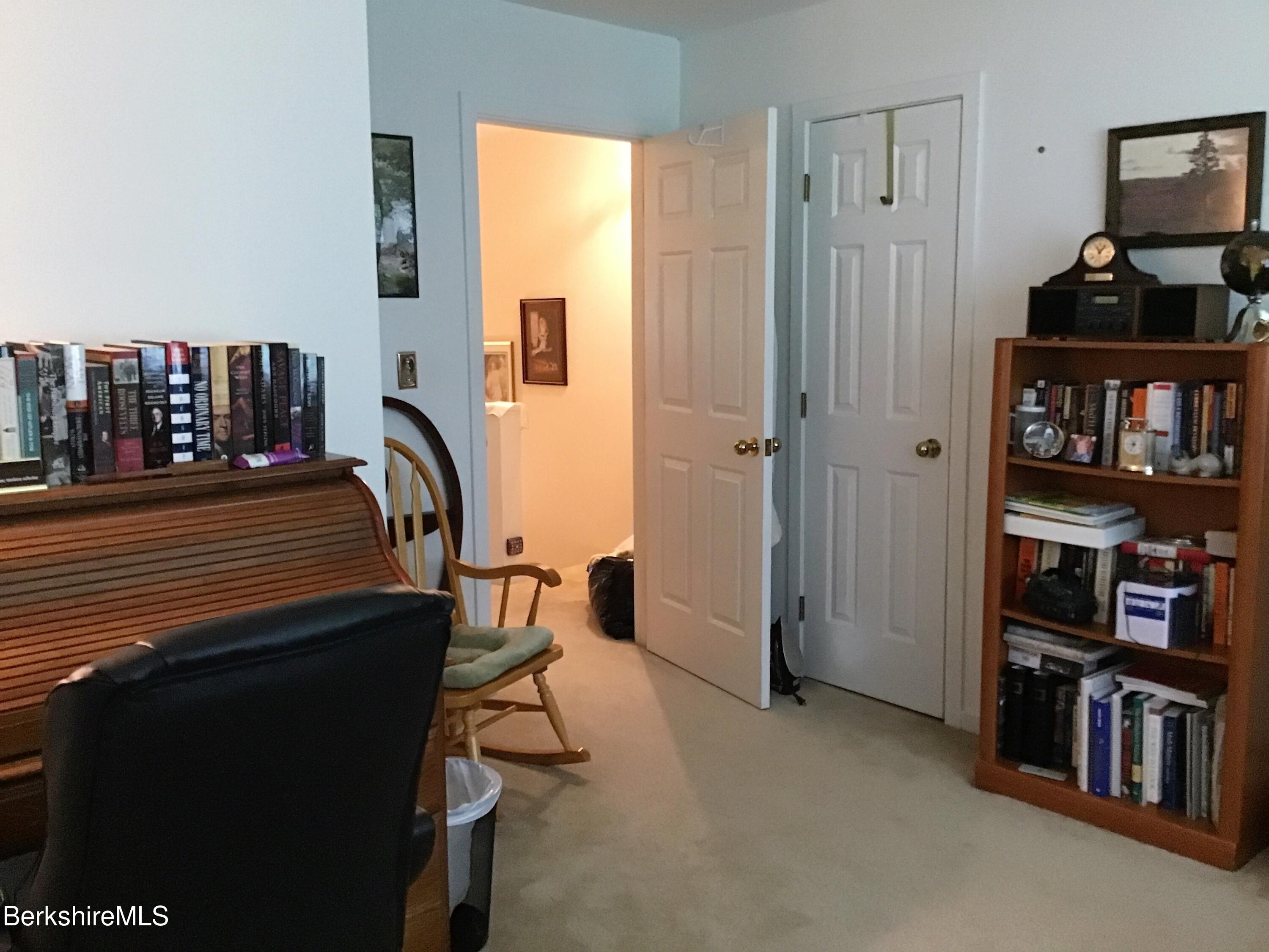 751 Mohawk Trail, Unit 1D North Adams, MA 01247 - Photo 25 of 32 a view of a livingroom with furniture and workspace