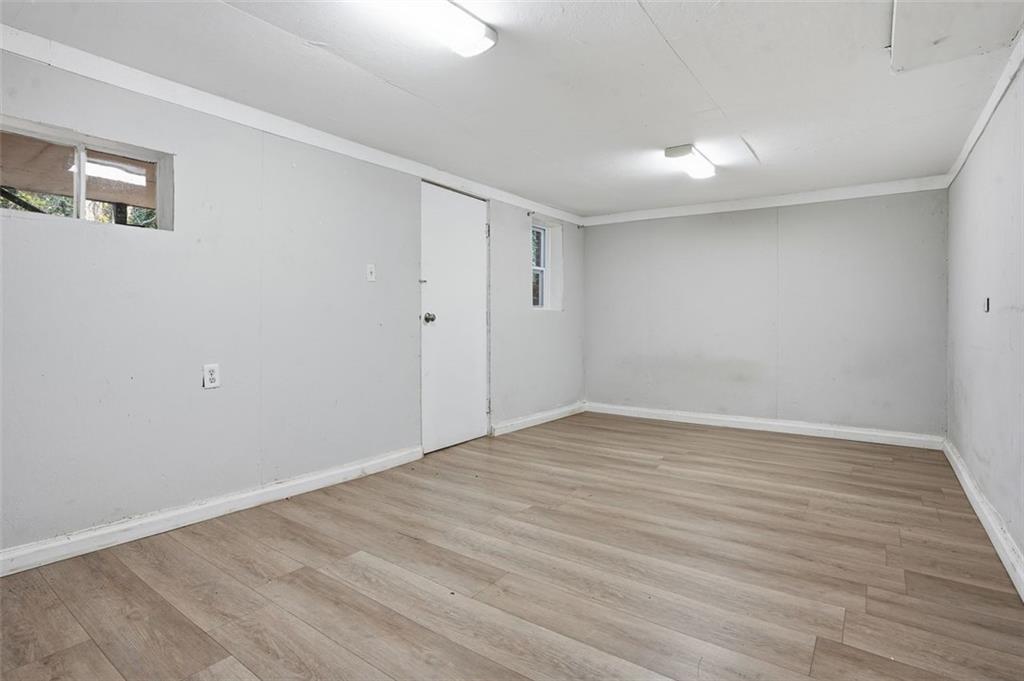 345 Brannan Road McDonough, GA 30253 - Photo 21 of 34 a view of an empty room with wooden floor