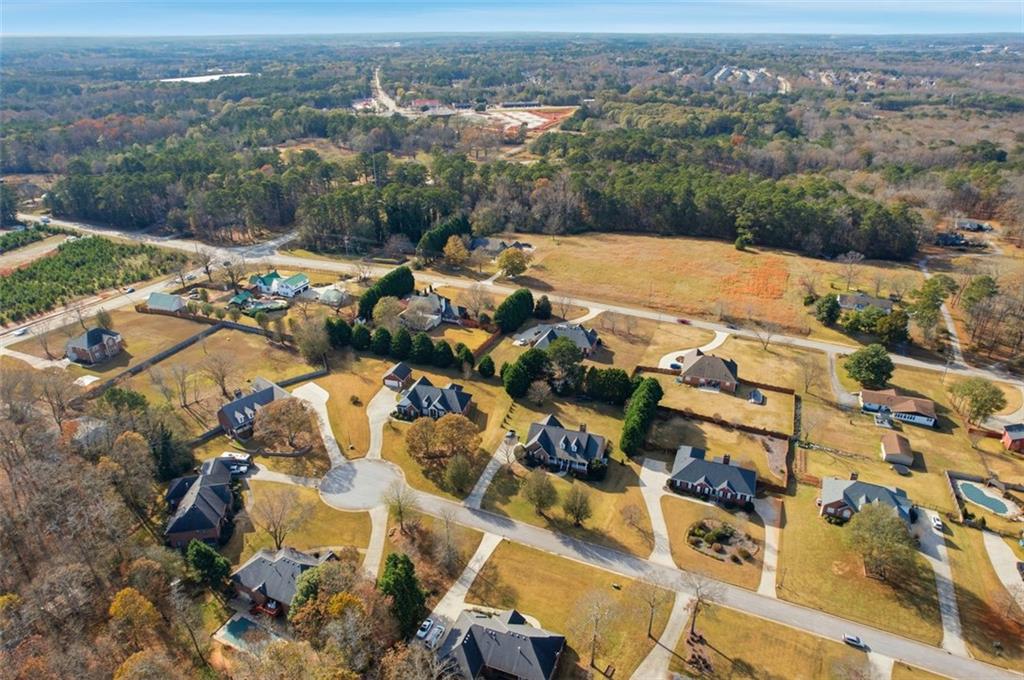 345 Brannan Road McDonough, GA 30253 - Photo 32 of 34 an aerial view of residential houses with outdoor space