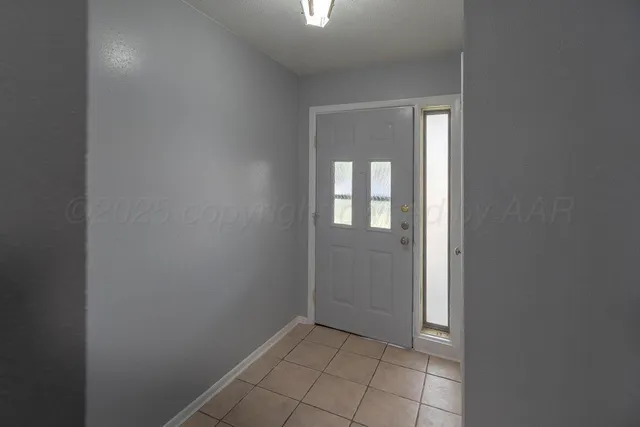 a view of an empty room with window