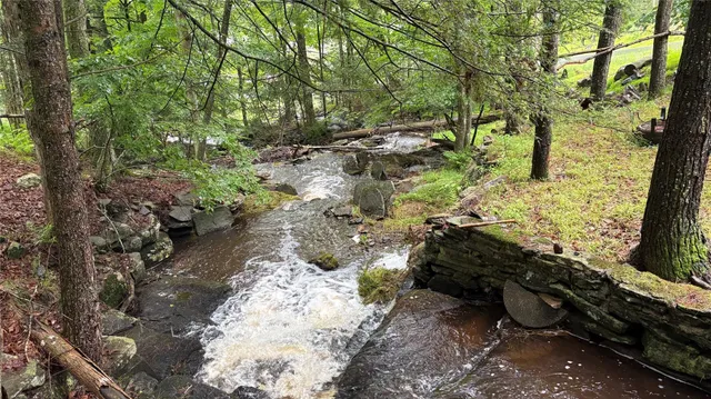 a kitchen with a stove and a refrigerator
