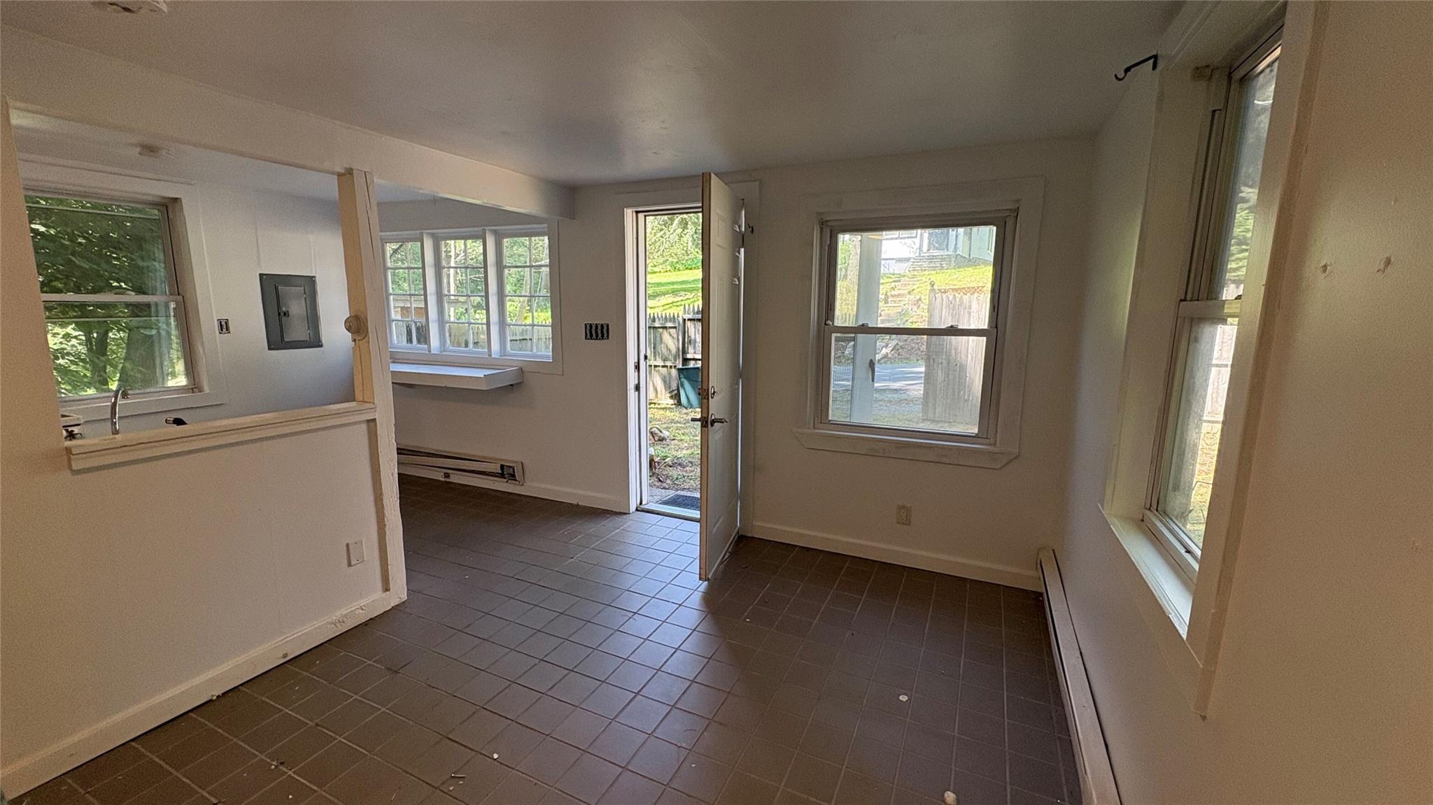 20 Airport Road Eldred, NY 12732 - Photo 17 of 23 an empty room with windows and cabinet