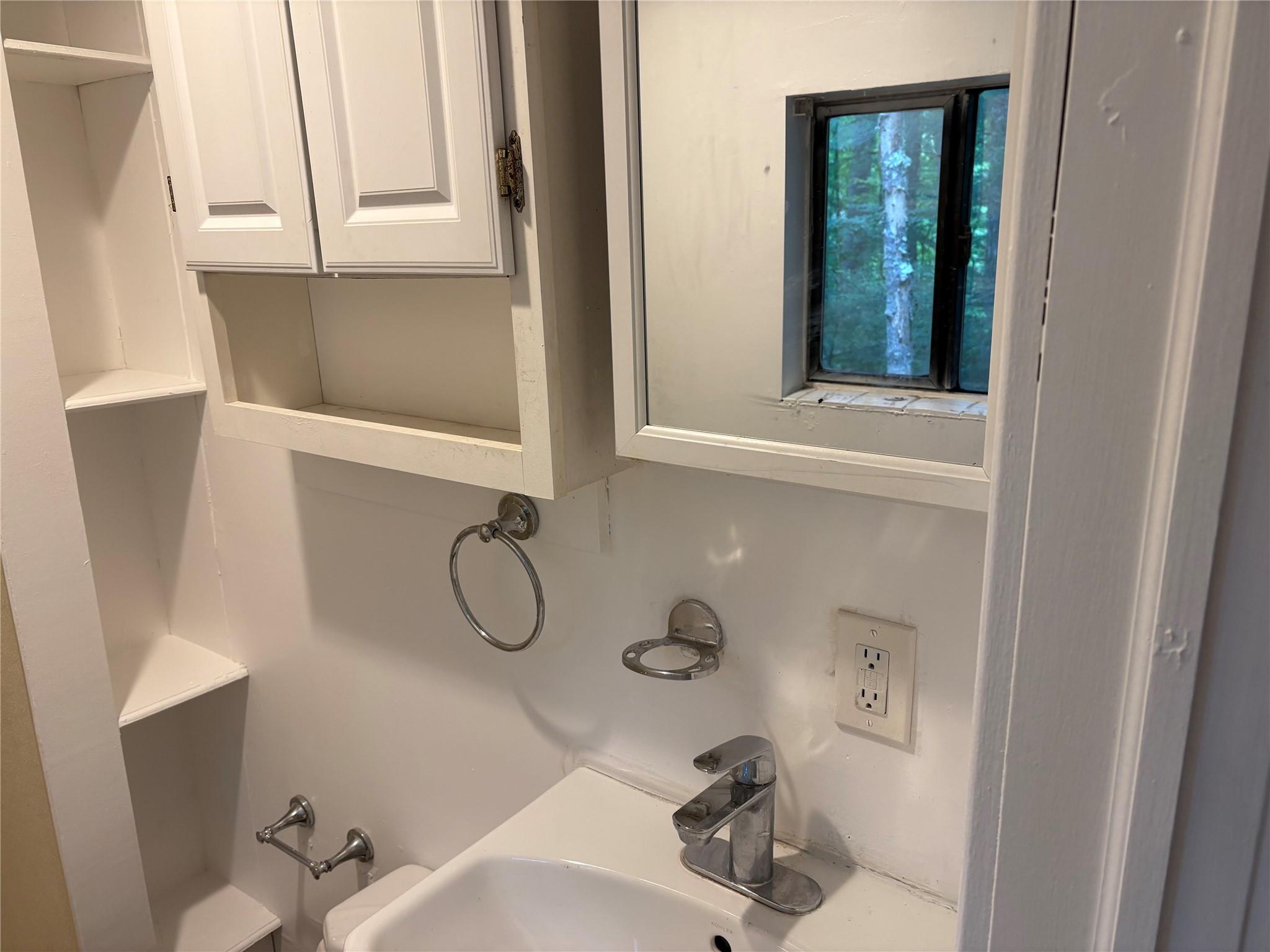 20 Airport Road Eldred, NY 12732 - Photo 22 of 23 a bathroom with a tub sink and mirror