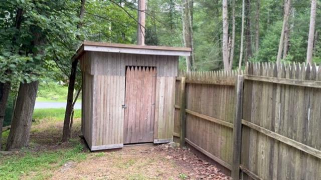 20 Airport Road Eldred, NY 12732 - Photo 10 of 23 a view of a wooden fence under a large tree