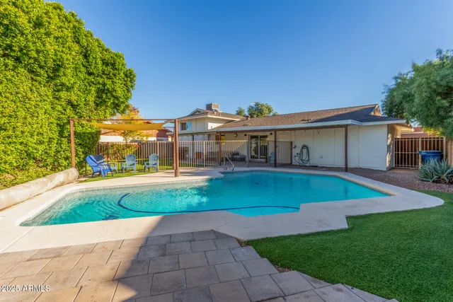 a view of outdoor space yard deck and swimming pool
