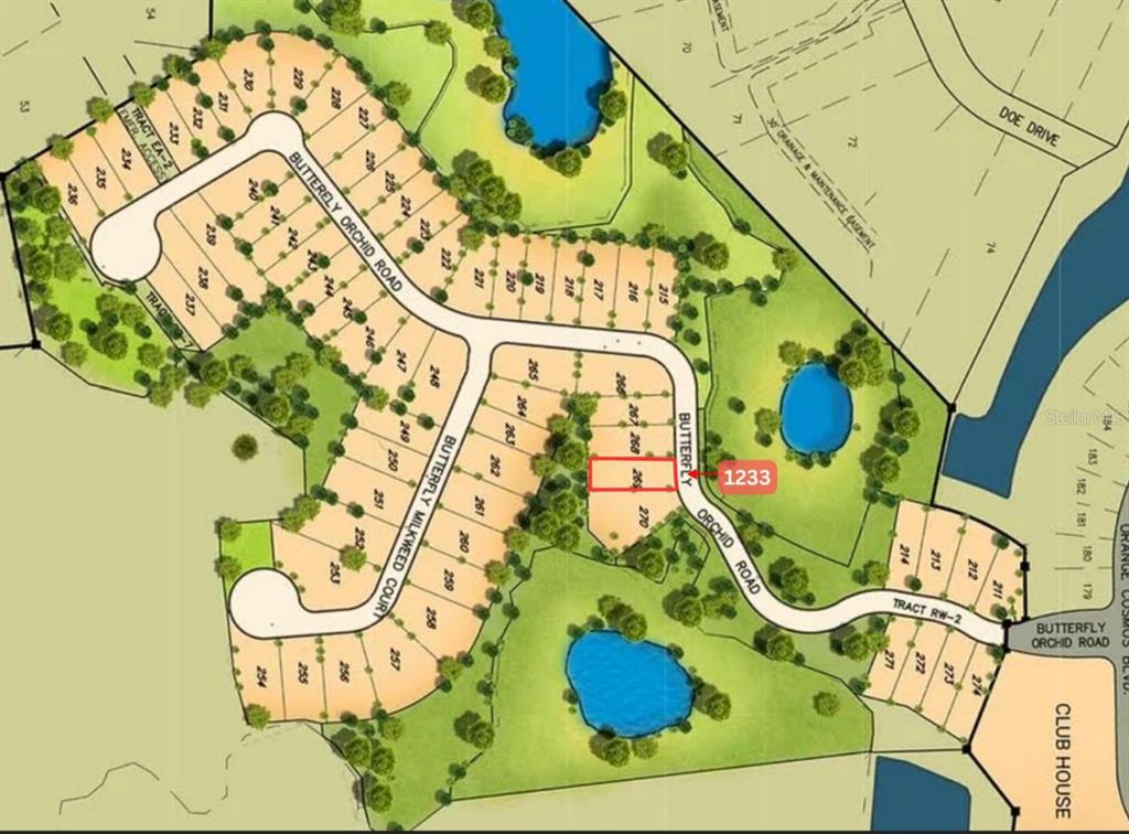 1233 Butterfly Orchid Road Davenport, FL 33837 - Photo 4 of 4 a bathroom with a bathtub and mirror