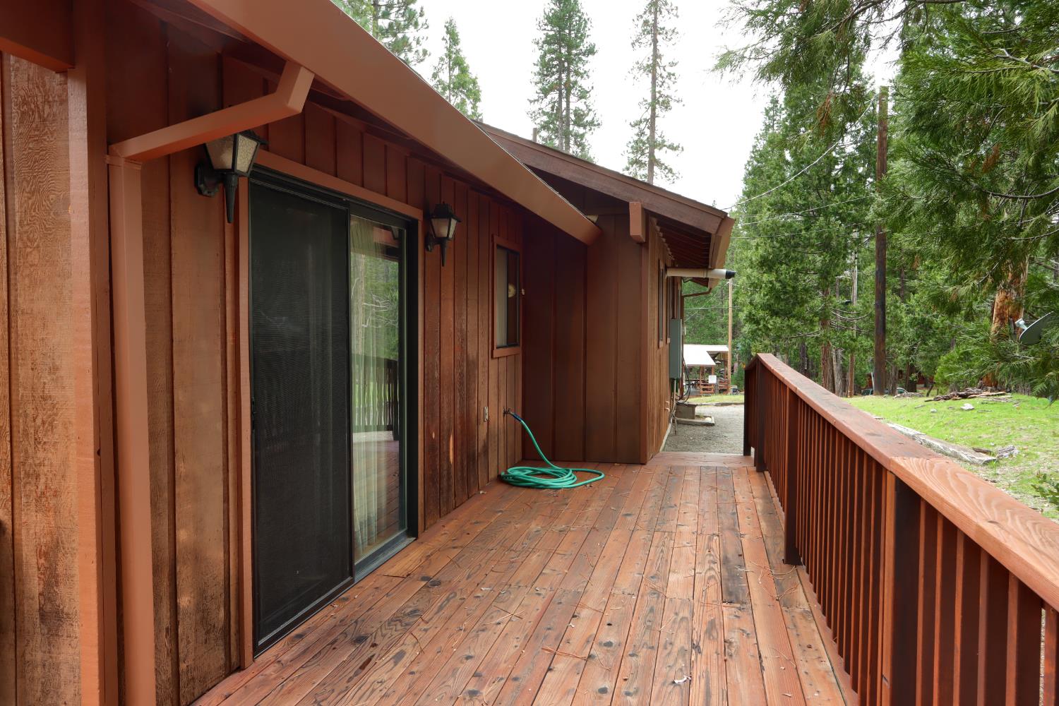 8041 Chilnualna Falls Road Wawona, CA 95389 - Photo 34 of 46 a view of outdoor space with deck and yard