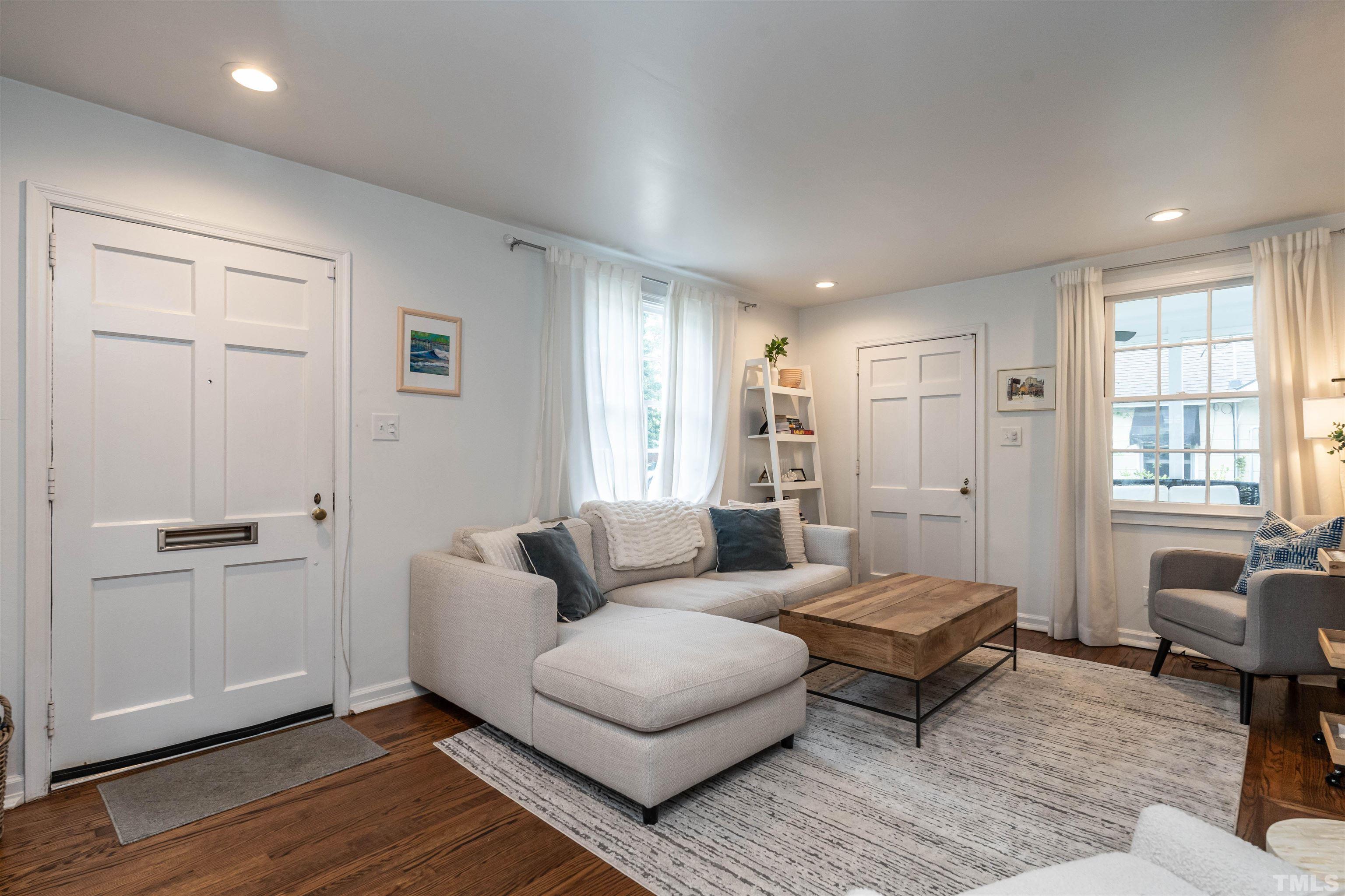 1204 Clifton Street Raleigh, NC 27604 - Photo 3 of 26 a living room with furniture and a window
