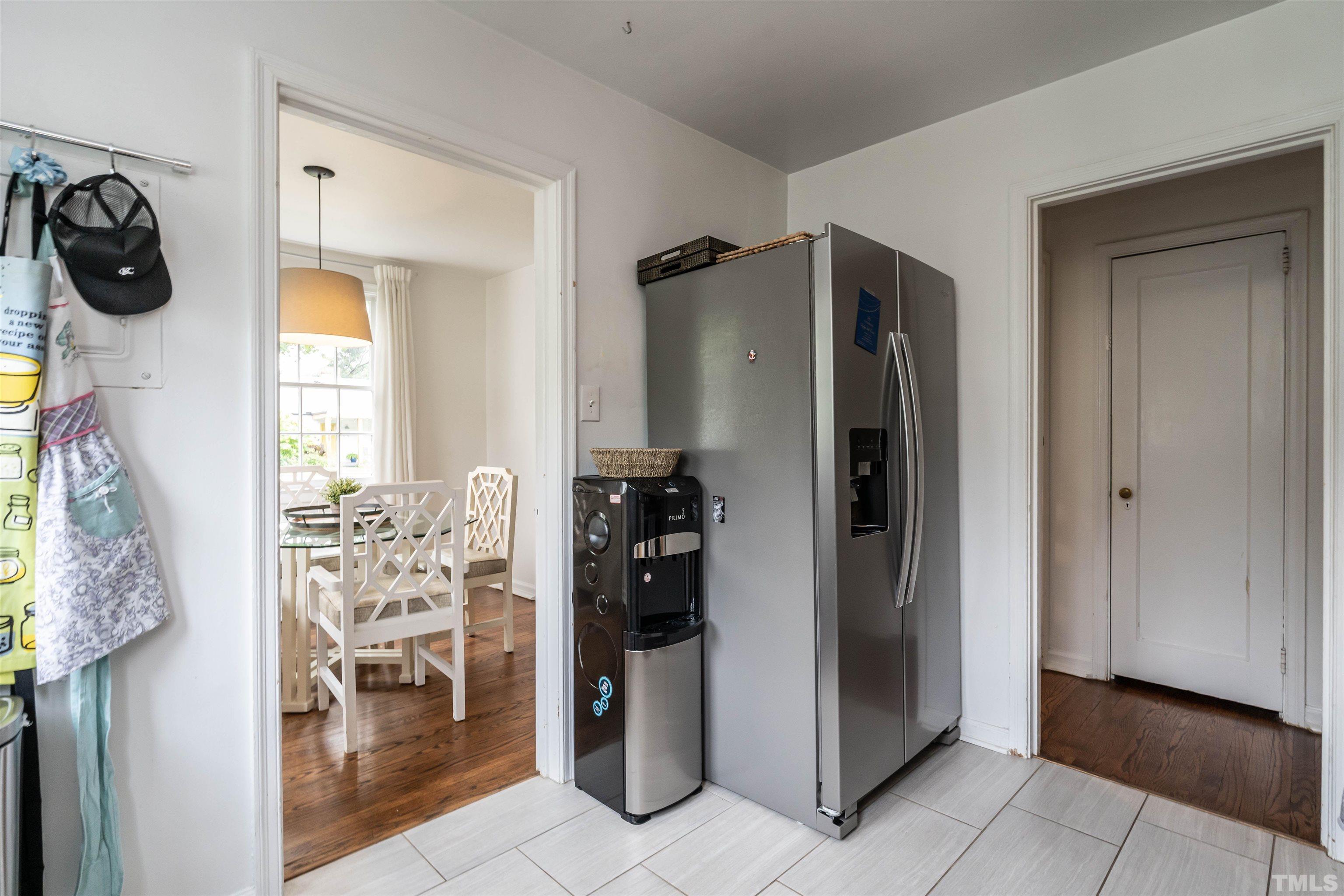 1204 Clifton Street Raleigh, NC 27604 - Photo 9 of 26 a view of a entryway and a livingroom with furniture