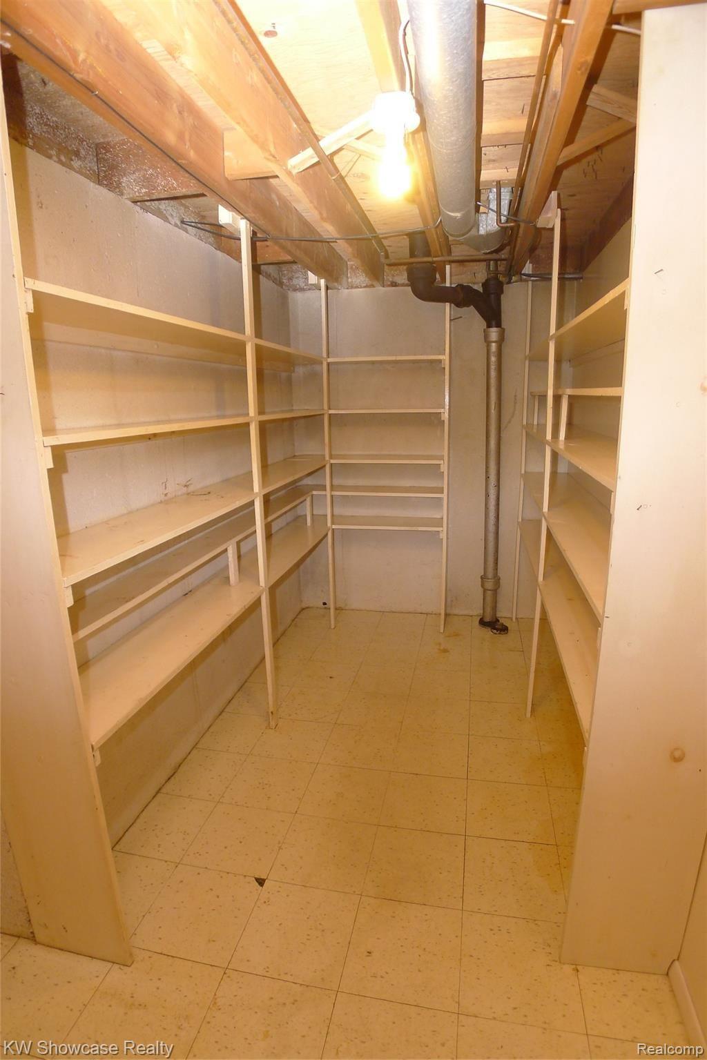 34264 Greentrees Road Sterling Heights, MI 48312 - Photo 29 of 42 Don't miss the tons of storage under basement stairs.