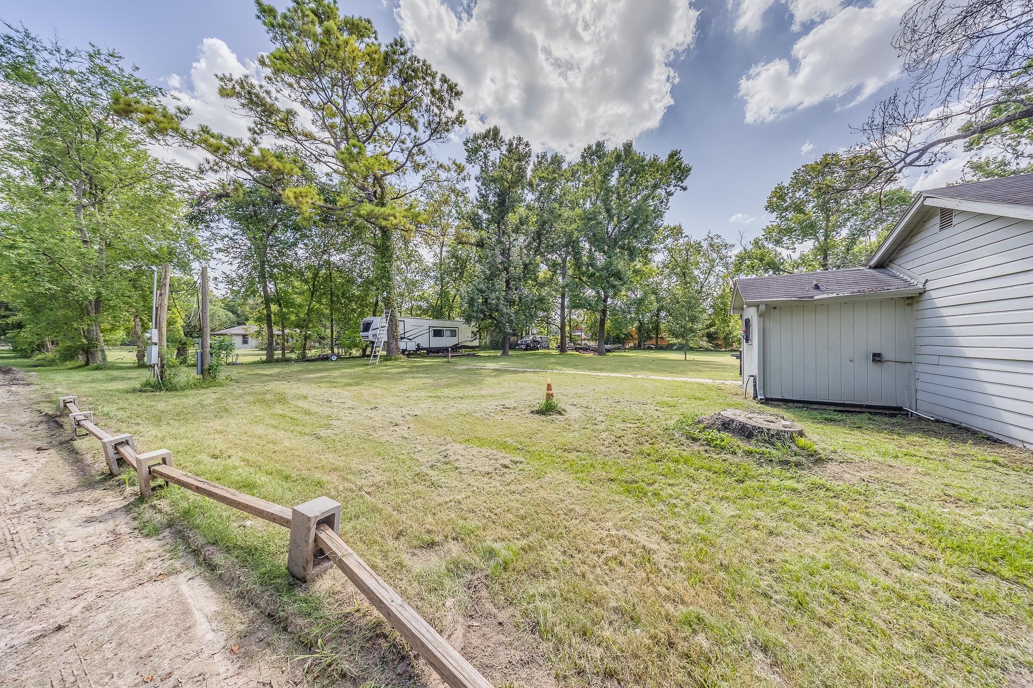 1725 Strawn Road Houston, TX 77039 - Photo 38 of 44 Open land surrounding the rear residence provides valuable separation and room for business-related activity.
