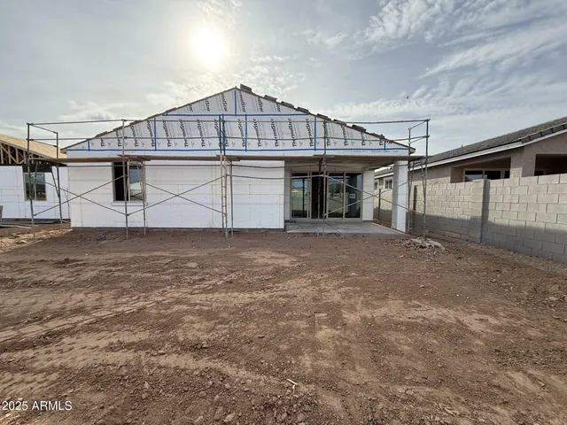 a bathroom with a bathtub sink and mirror