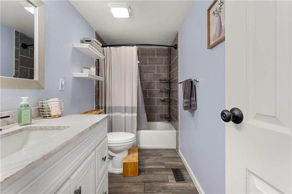 137 Walnut Strand Imperial, PA 15126 - Photo 16 of 37 a bathroom with a sink toilet and shower