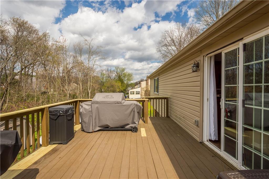 137 Walnut Strand Imperial, PA 15126 - Photo 25 of 37 a view of a balcony with wooden floor and fence