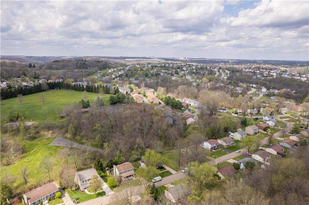 137 Walnut Strand Imperial, PA 15126 - Photo 34 of 37 an aerial view of a city with lots of residential buildings