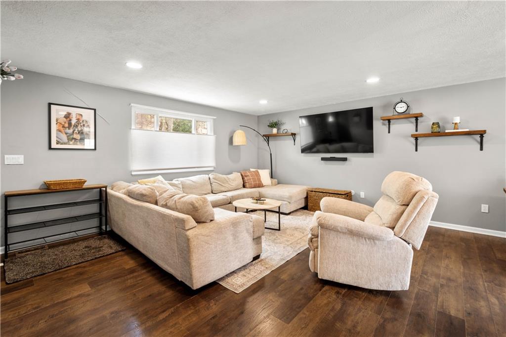 137 Walnut Strand Imperial, PA 15126 - Photo 5 of 37 a living room with furniture and a flat screen tv