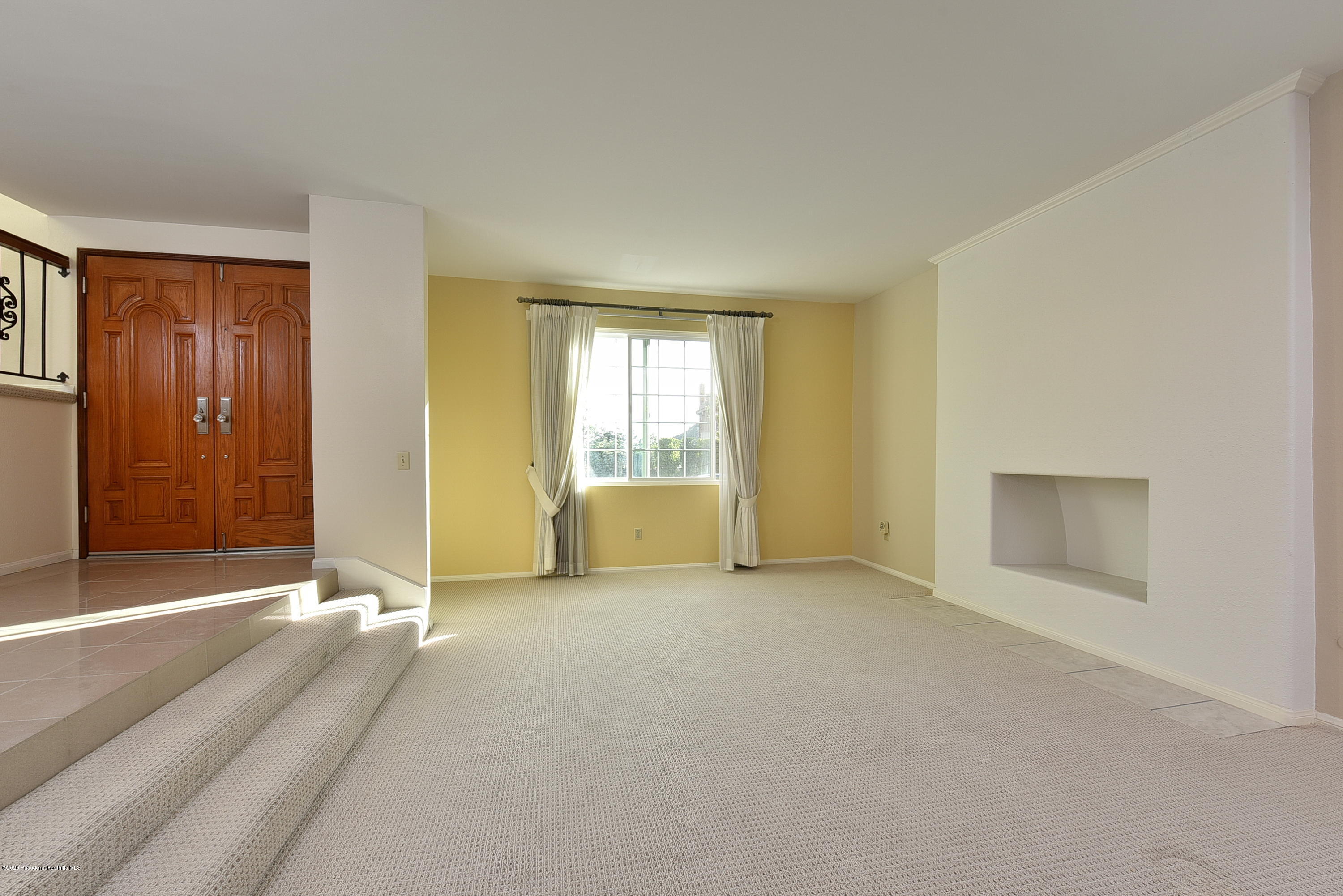 3107 Chadney Drive Glendale, CA 91206 - Photo 4 of 26 an empty room with windows