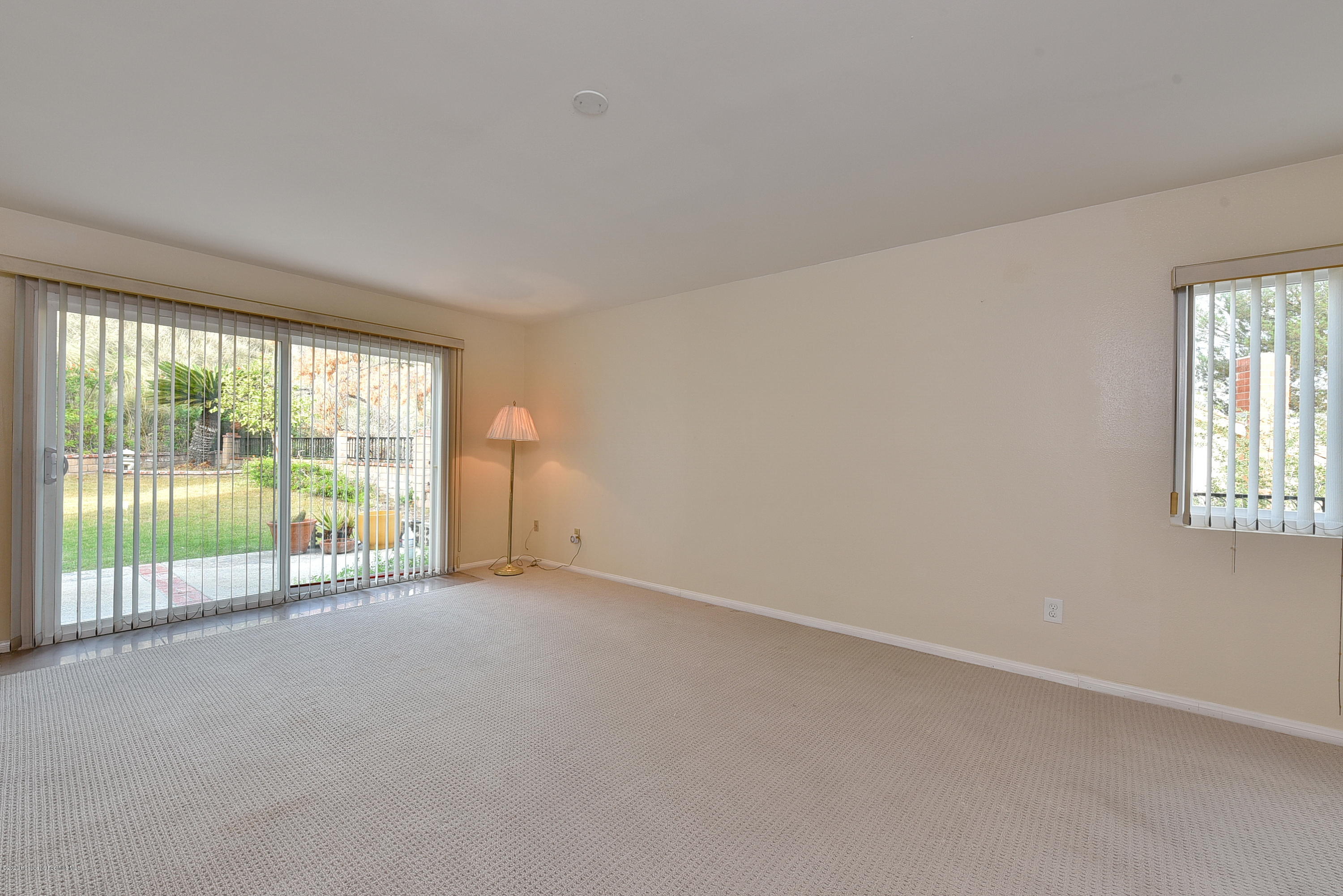 3107 Chadney Drive Glendale, CA 91206 - Photo 9 of 26 an empty room with windows