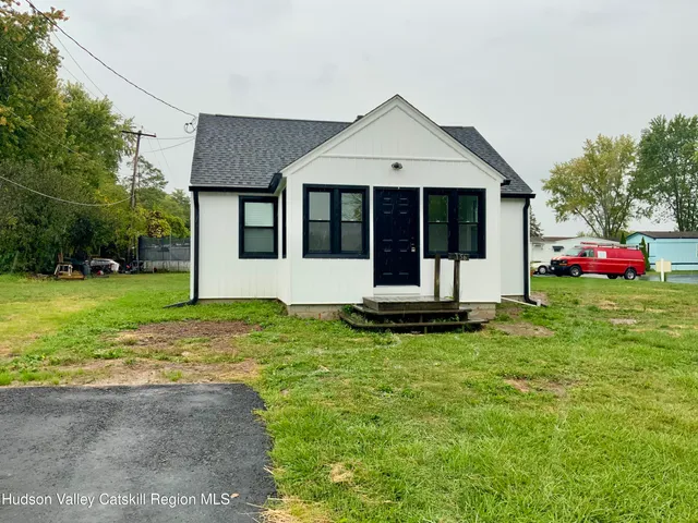 a view of a house with garden