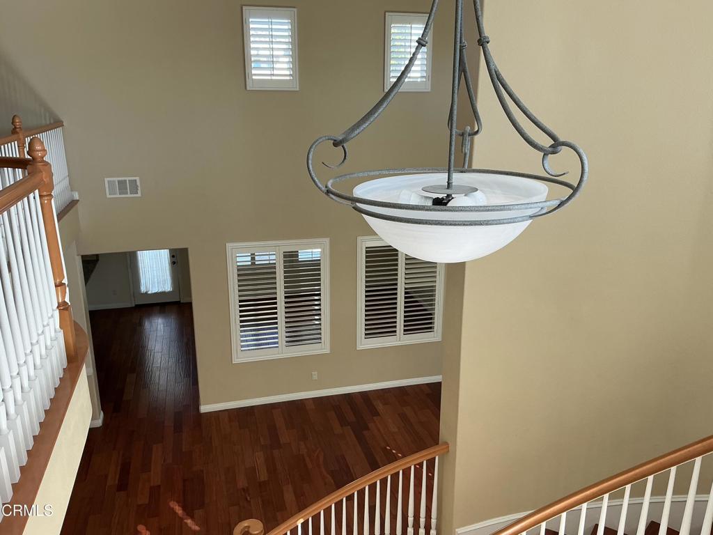 13687 Blue Ridge Way Moorpark, CA 93021 - Photo 23 of 46 a view of a livingroom with furniture wooden floor and windows