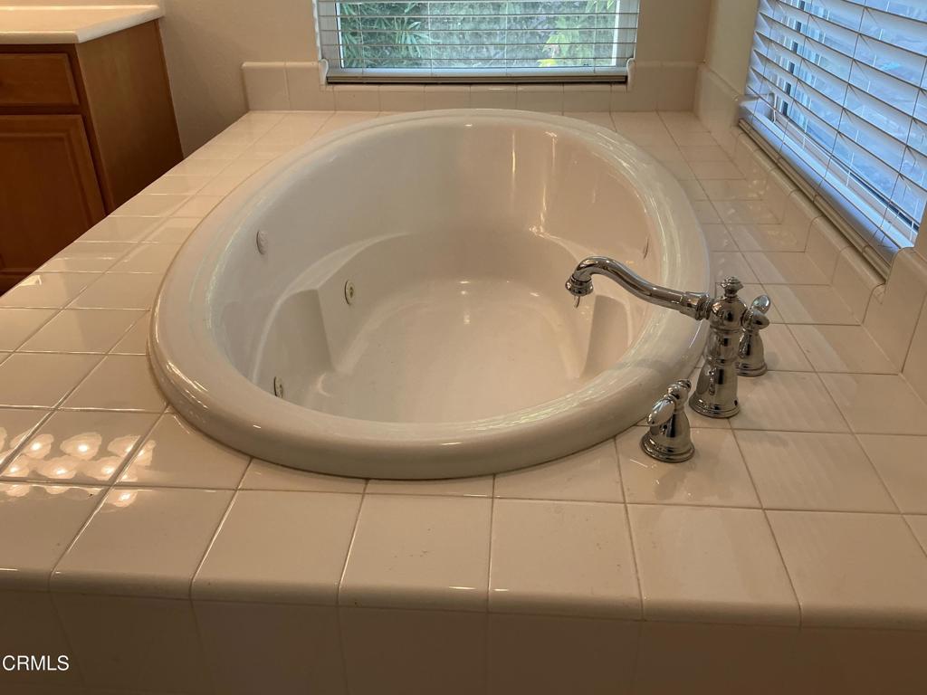 13687 Blue Ridge Way Moorpark, CA 93021 - Photo 30 of 46 a bathroom with a bathtub