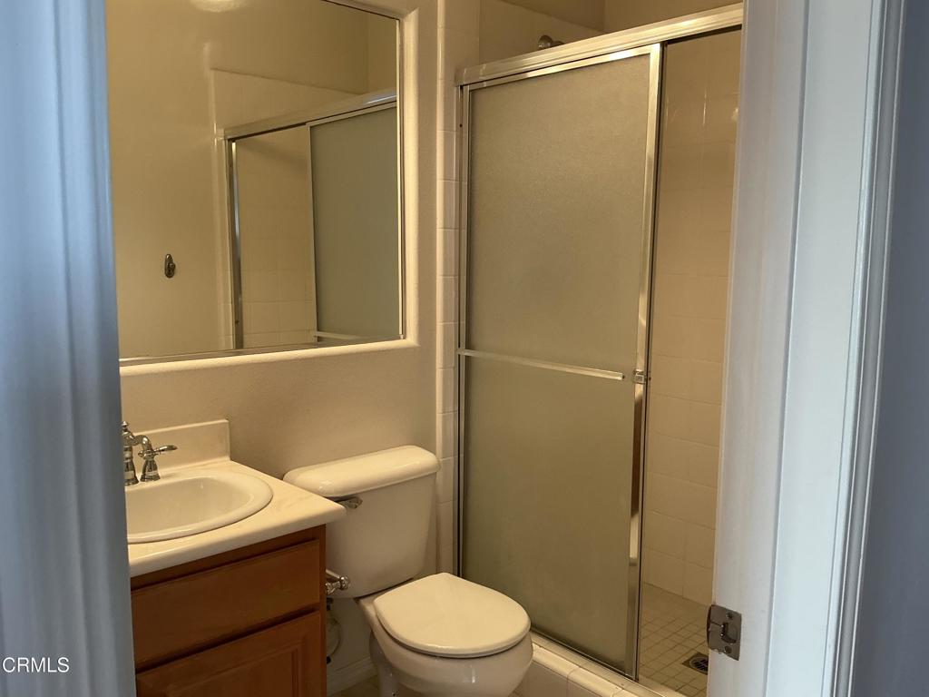 13687 Blue Ridge Way Moorpark, CA 93021 - Photo 43 of 46 a bathroom with a sink a toilet and shower