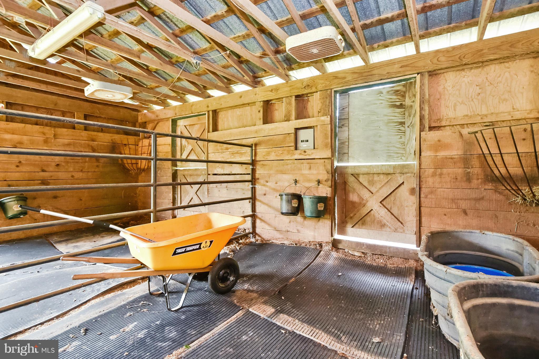 5167 Red Cedar Road Sumerduck, VA 22742 - Photo 22 of 30 a backyard with a sink and black appliances