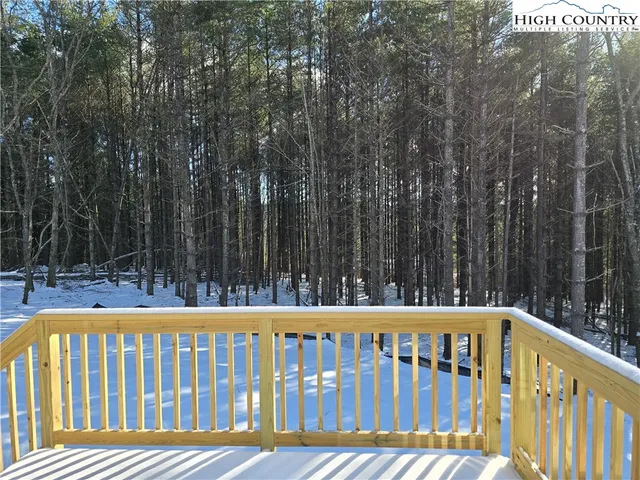 a view of a wooden fence