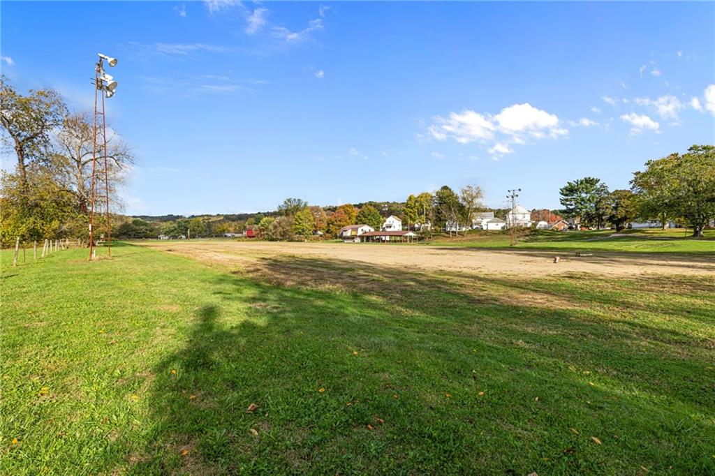 100 1st Street Darlington, PA 16115 - Photo 12 of 16 a view of a big yard with swimming pool and large trees