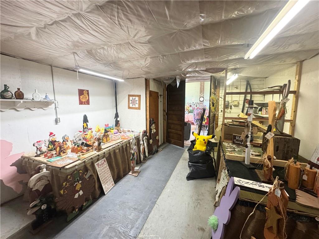 1677 Shady Plain Road Apollo, PA 15613 - Photo 15 of 21 a living room with furniture and gym equipment