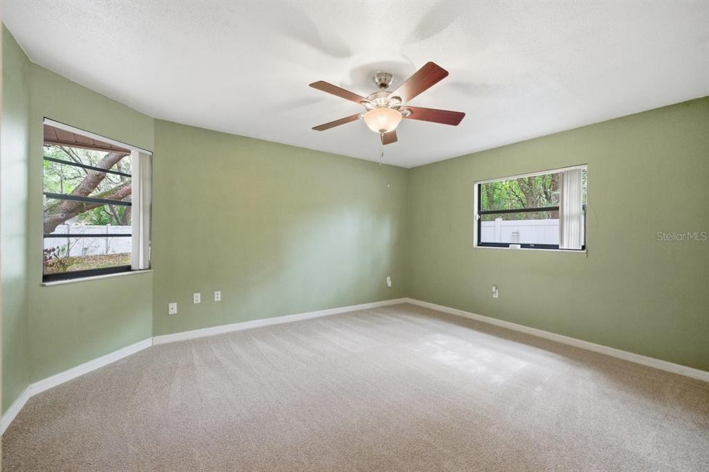 8316 Kingsdale Street Spring Hill, FL 34608 - Photo 12 of 30 a view of a big room with windows