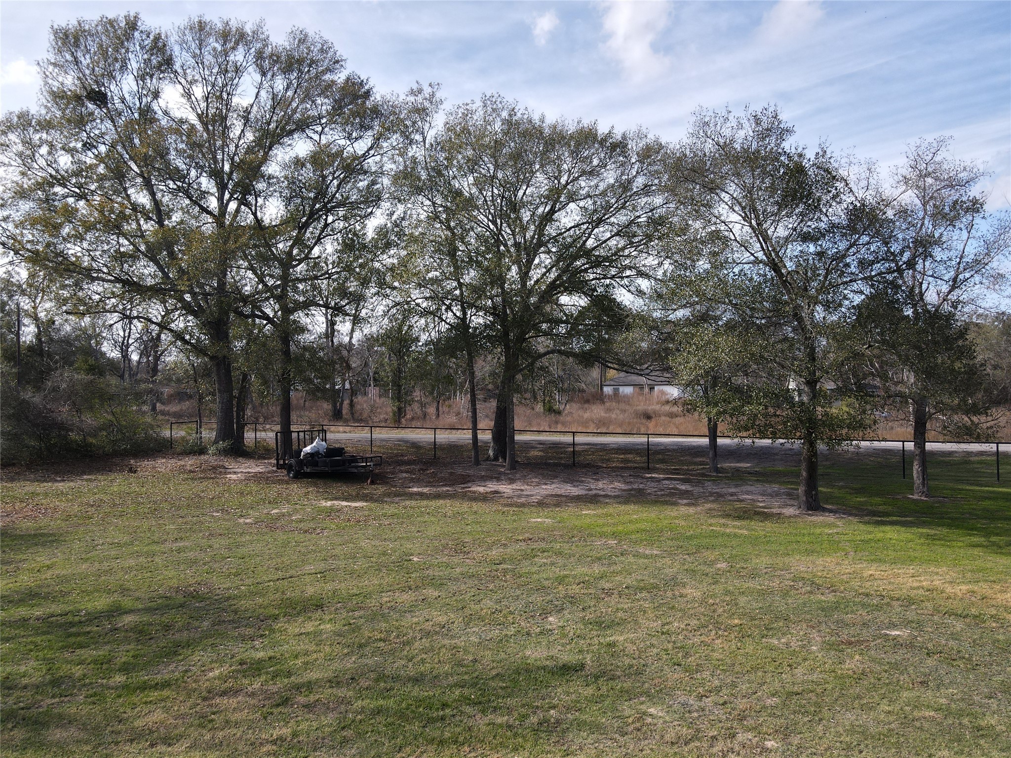 87-ac Tbd Donegal Street Hempstead, TX 77445 - Photo 8 of 8 a view of a yard with wooden fence