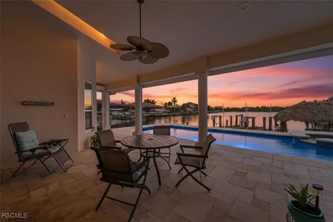 a view of a patio with couches chairs and a table