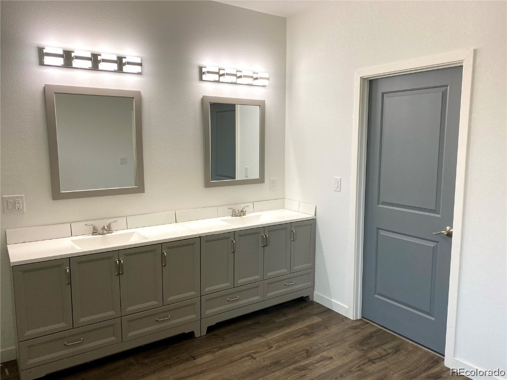 347 Lake View Road Hayden, CO 81639 - Photo 7 of 19 a bathroom with double vanity sink and a mirror