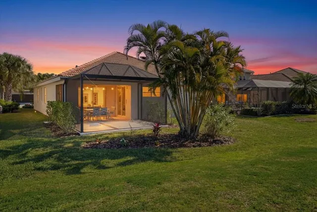 an aerial view of a house with a garden