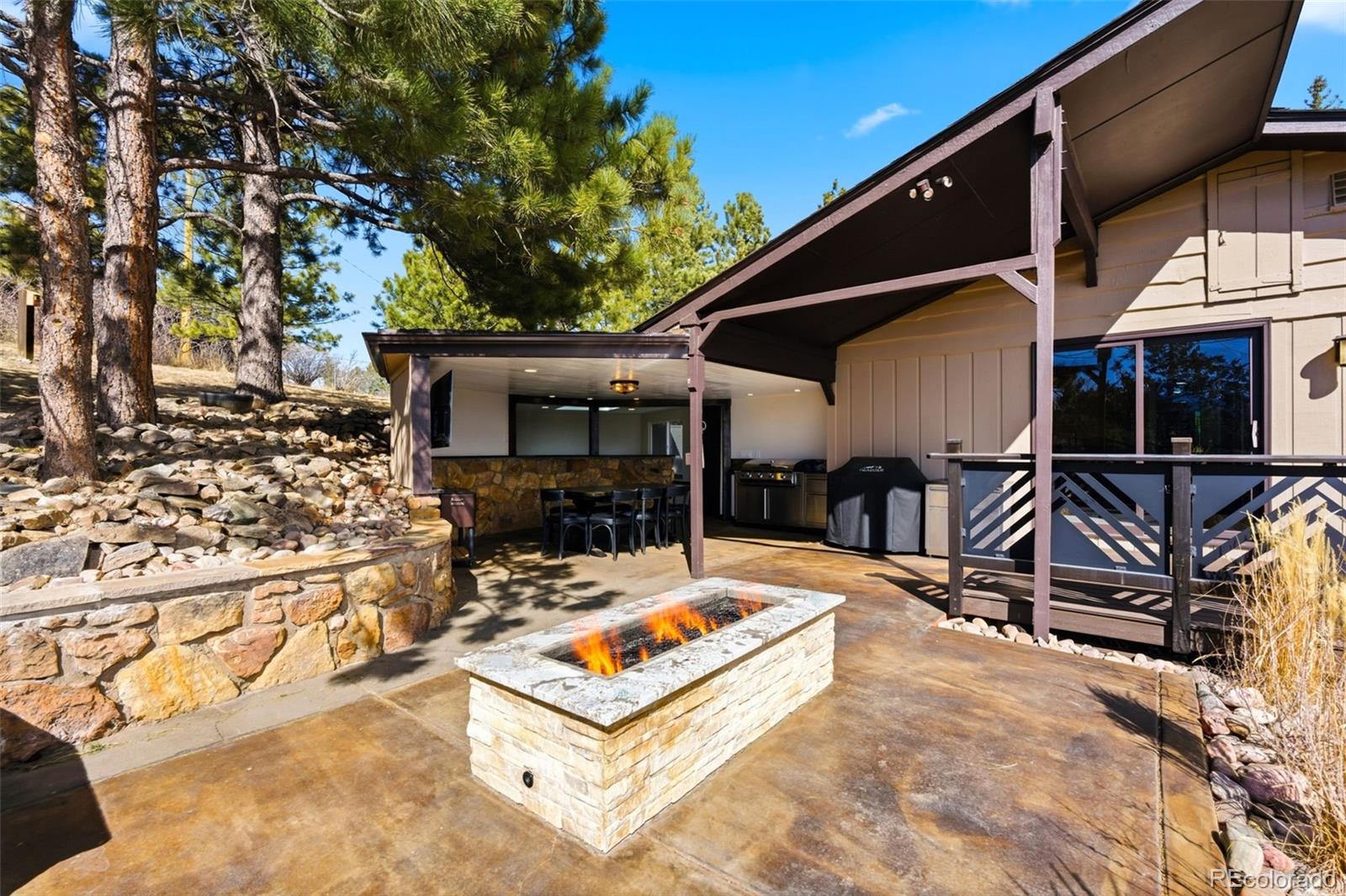 3155 Chestnut Circle Evergreen, CO 80439 - Photo 34 of 50 an outdoor space with seating