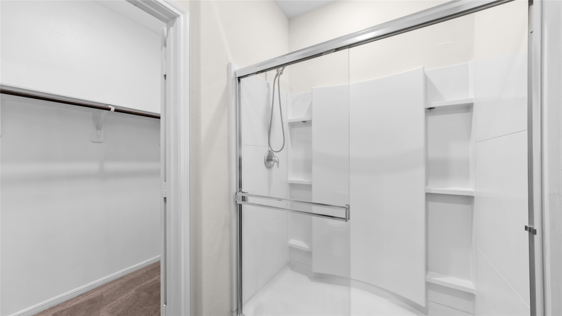 14510 Chasing Bend Drive Houston, TX 77069 - Photo 12 of 22 a bathroom with a glass shower door