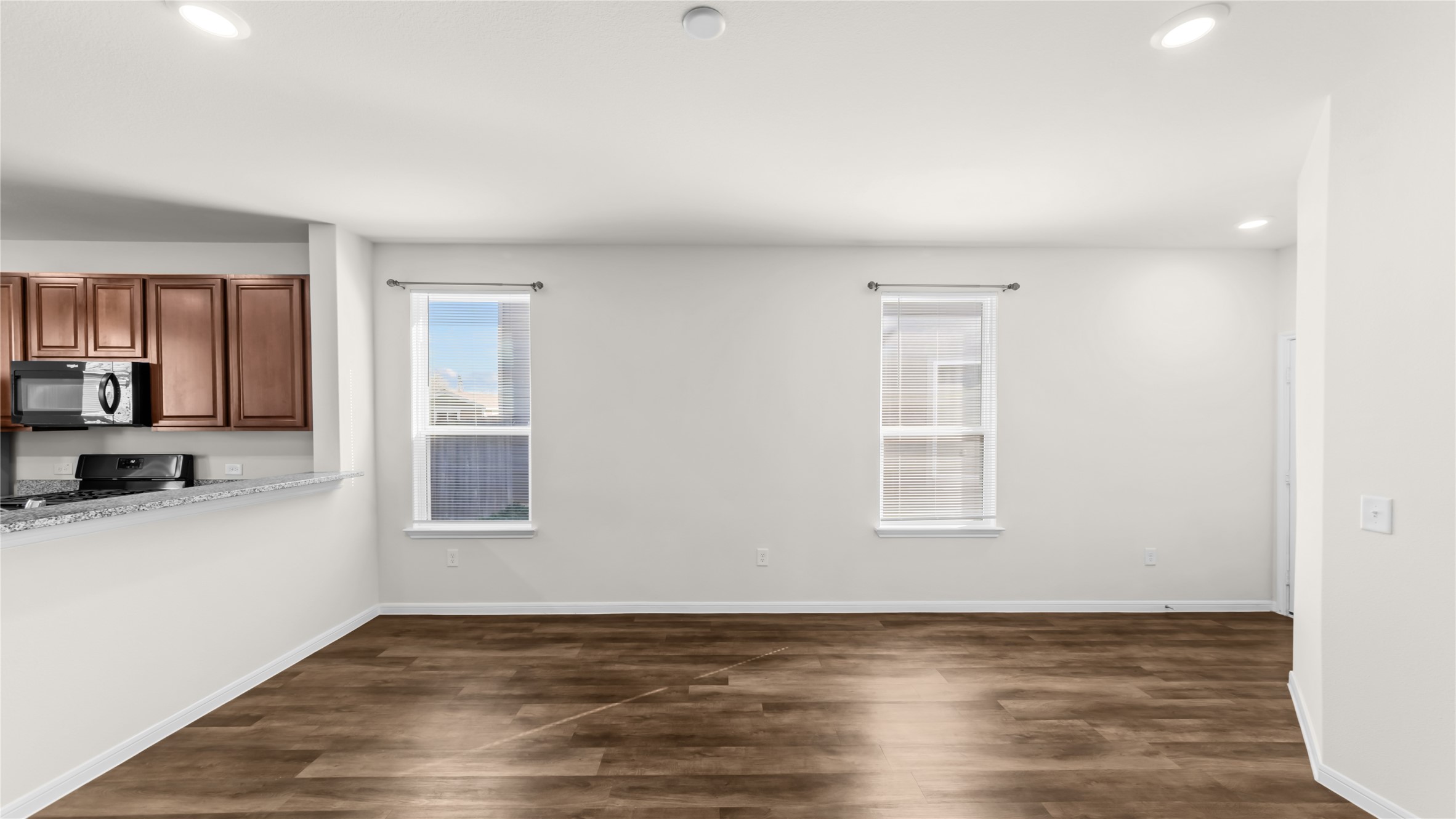 14510 Chasing Bend Drive Houston, TX 77069 - Photo 4 of 22 a view of a kitchen with wooden floor and a window