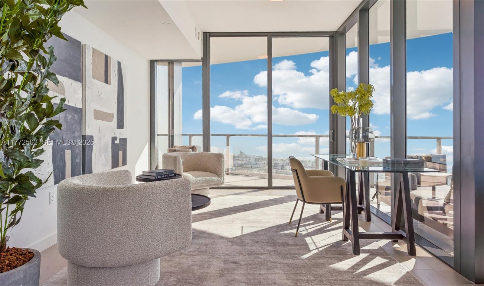 500 Alton Road, Unit 4201 05 Miami Beach, FL 33139 - Photo 20 of 61 a dining room with furniture and a floor to ceiling window