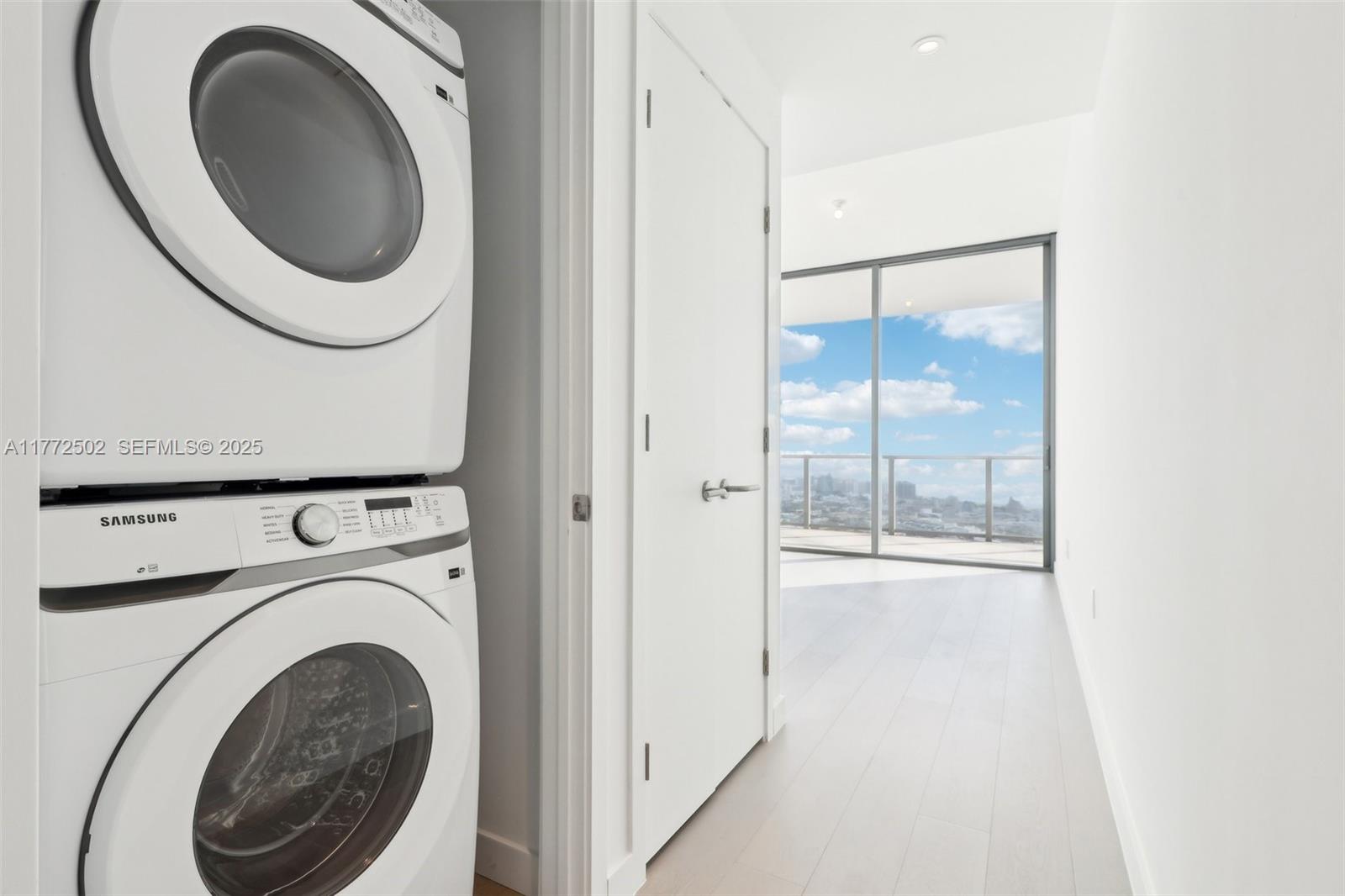 500 Alton Road, Unit 4201 05 Miami Beach, FL 33139 - Photo 24 of 61 a close view of a utility room with washer and dryer
