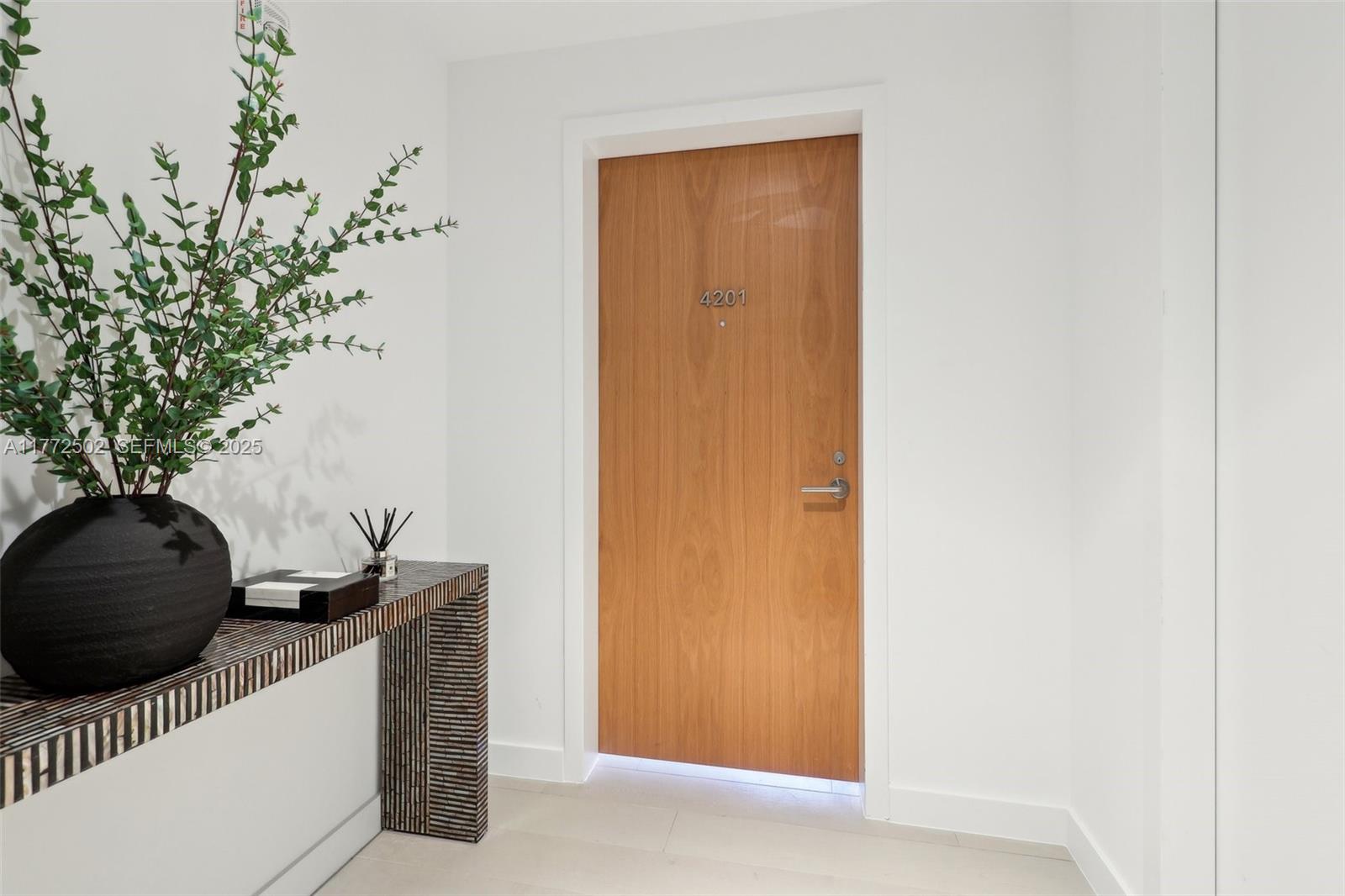 500 Alton Road, Unit 4201 05 Miami Beach, FL 33139 - Photo 4 of 61 a view of entryway with wooden floor