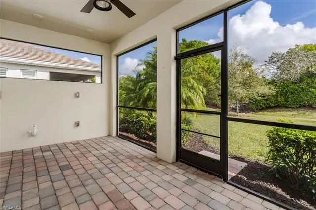 a view of a glass door and an entryway